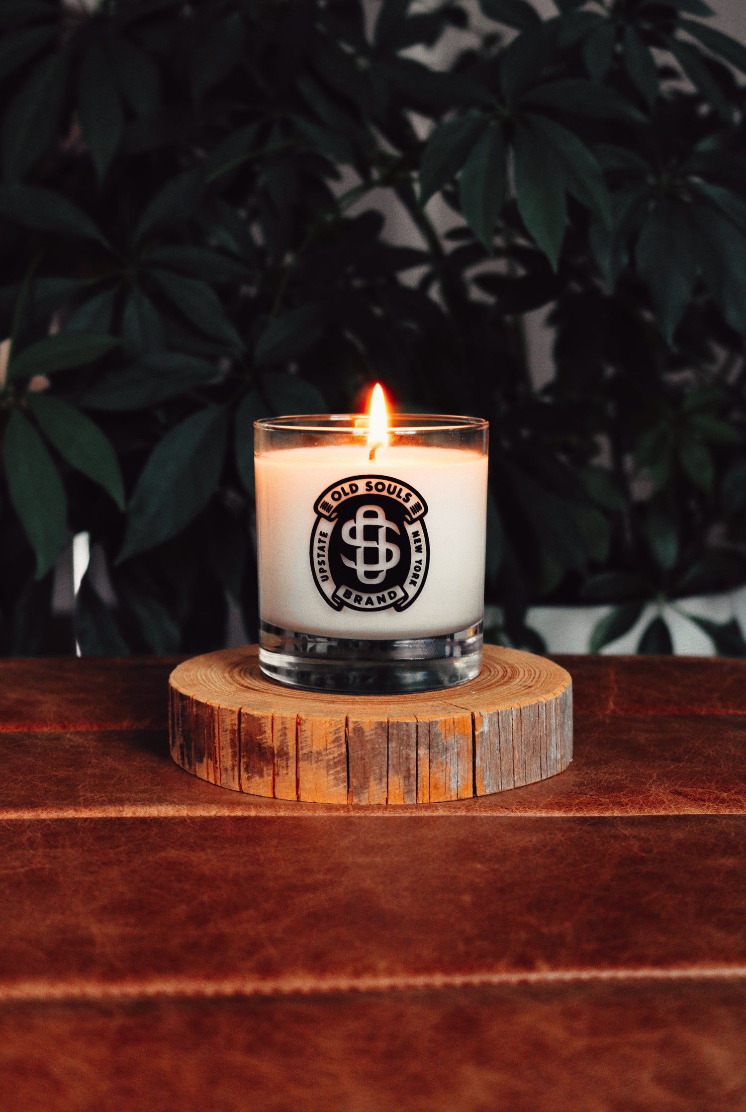 Custom branded soy candle made for Old Souls outdoor shop by Mundane in Cold Spring, New York